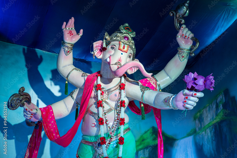 Fototapeta premium A Closeup shot Ganpati Installed in a Pandal during the 10 Day Ganesh Festival, the idols are immersed in heavy water bodies after the 10 days.
