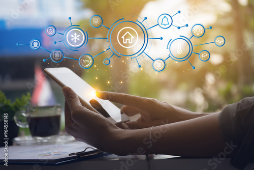 Woman hands using smart phone for Home application