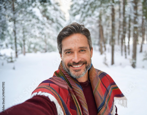 Winter Portrait of Happy Handsome Man Smiling Outdoors