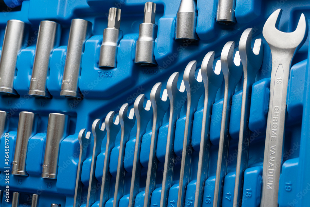 Fototapeta premium open ended wrench set in a toolbox, close up