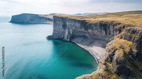 The iconic view of the gsvatn lake, perched above the ocean on the island of photo