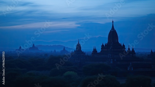 The temples of Bagan at dusk, with the last light of day fading and the sky turning a deep blue.