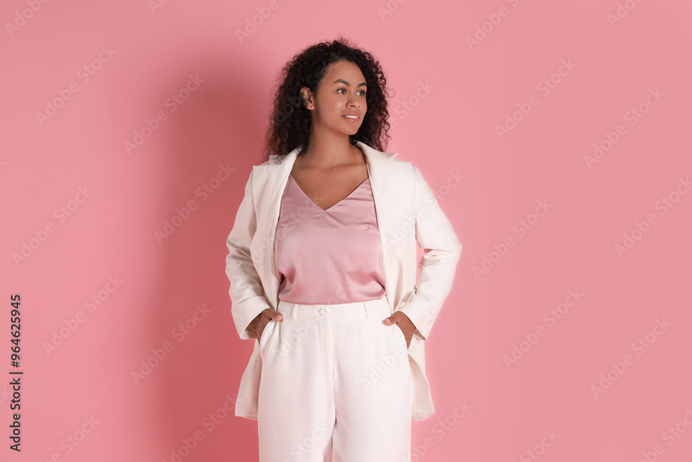 Beautiful woman in stylish suit on pink background Beautiful woman in stylish suit on pink background