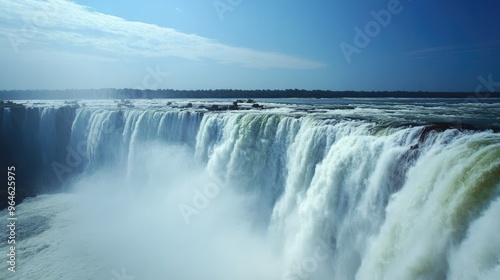 The view from the top of the Iguazu Falls, looking down into the Devil Throat with the water crashing below.