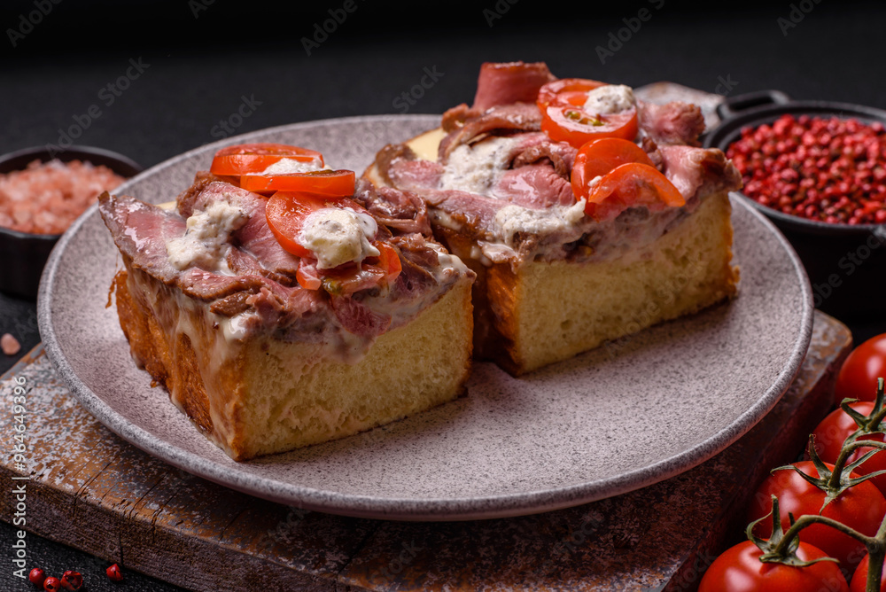 Sandwich with brioche bun, roast beef, tomatoes, stracciatello Sandwich with brioche bun, roast beef, tomatoes, stracciatello