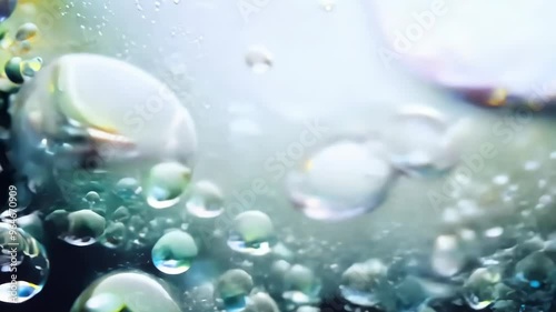 Wallpaper Mural Holographic rainbow colored soap bubbles flowing in liquid water or oil on the black background Torontodigital.ca