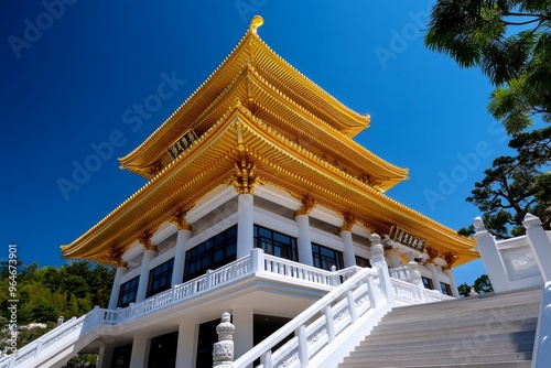 Golden Pavilion standing proud against a deep blue sky its gold shimmering brightly in the clear, crisp air