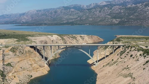 Maslenica Bridge Most in Croatia. The Maslenica Bridge is a deck arch bridge carrying the state road spanning the Novsko Zdrilo strait of the Adriatic Sea. Beautiful Landscape in Background. Drone 4k photo