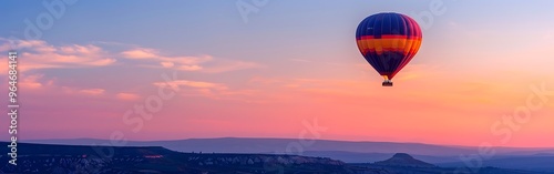 hot air balloon flying above the clouds