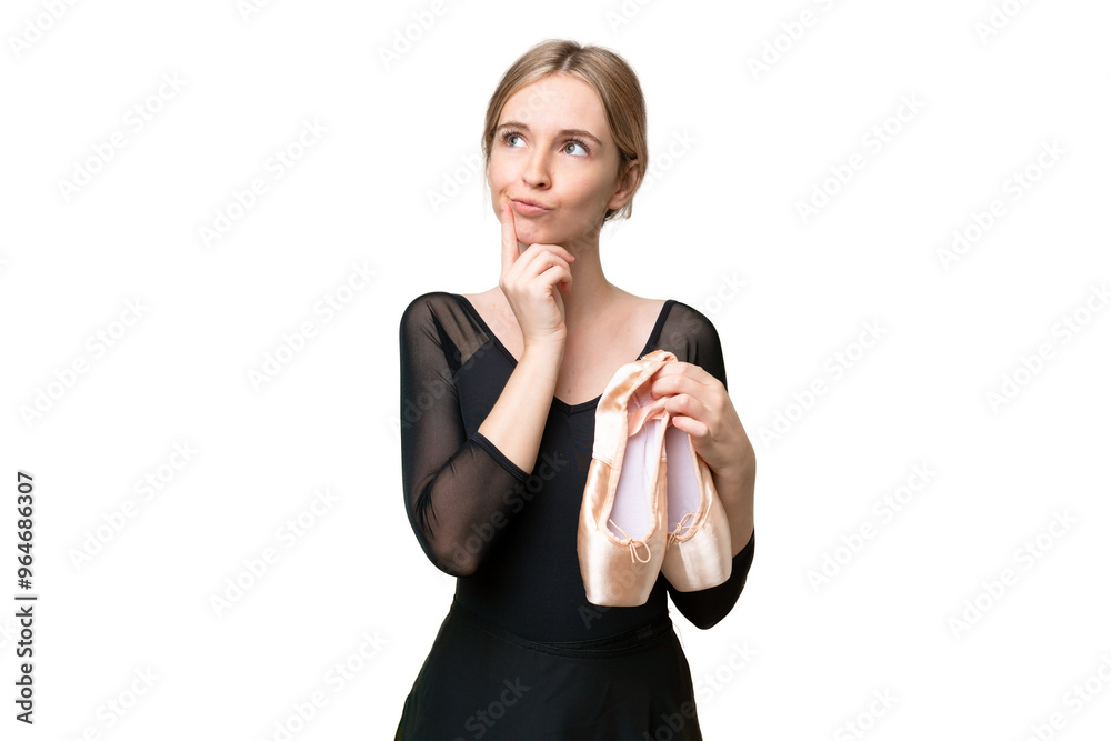 Obraz premium Young English woman practicing ballet over isolated background having doubts while looking up
