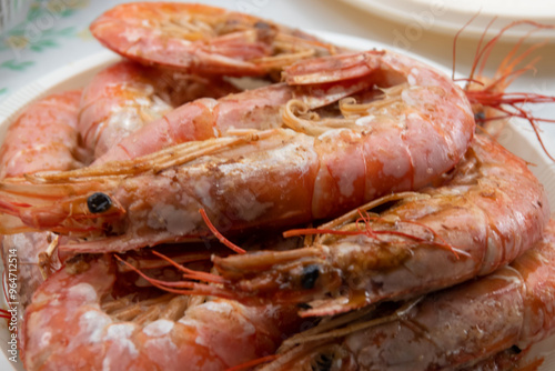 a plate of grilled shrimp with salt