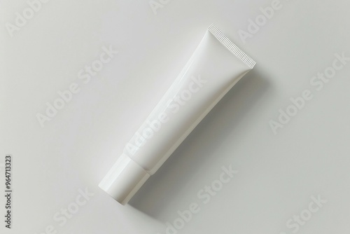 a tube of toothpaste on a white surface