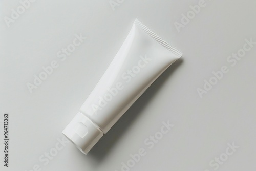 a tube of toothpaste on a white surface