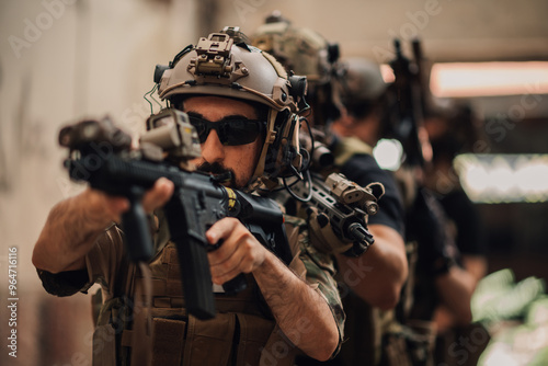 Group of armed forces with rifles in action preparing for combat.