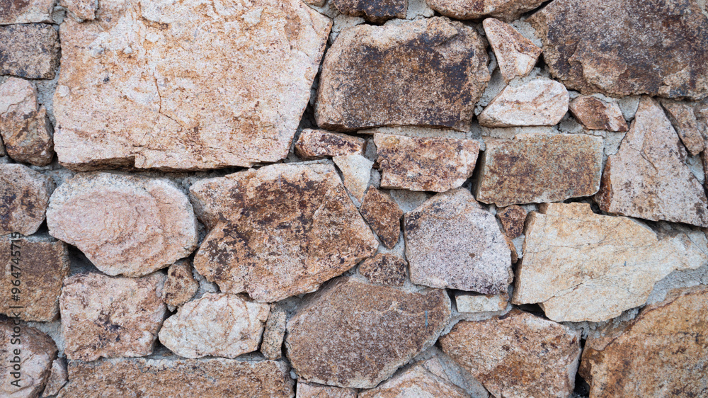 Real stone wall background in detail. Real stone wall background in detail.