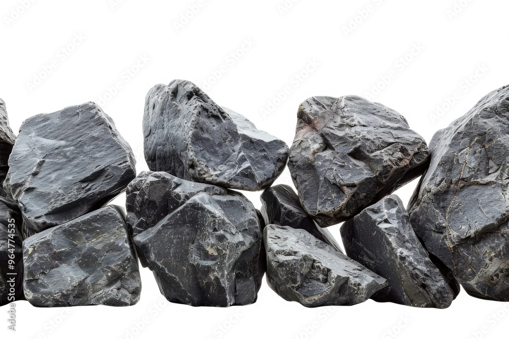 A collection of rocks arranged neatly next to each other A collection of rocks arranged neatly next to each other