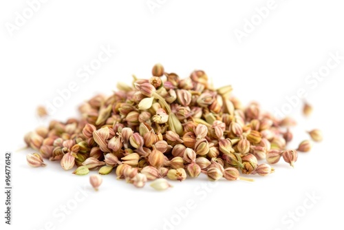 A pile of pistachio seeds on a white background, perfect for use in recipes or food-related graphics photo