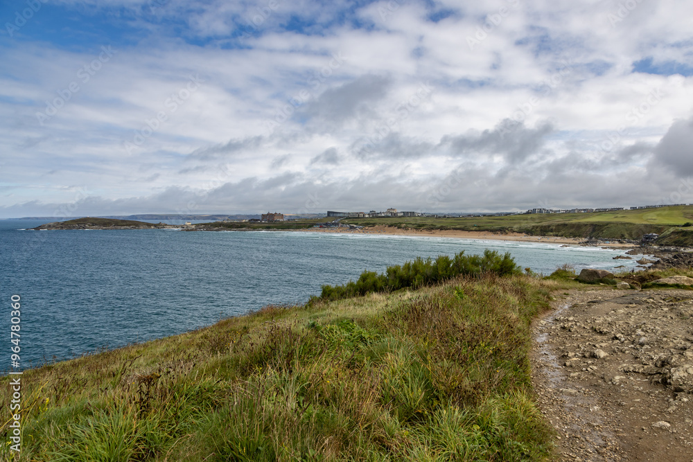 Looking along the coastline towards Fistral Beach in Newquay, on a summer's day Looking along the coastline towards Fistral Beach in Newquay, on a summer's day