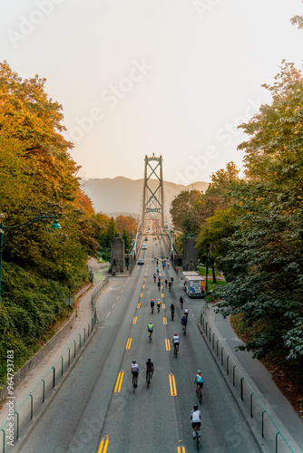 Lions gate bridge with people bicycle pass by bridge background 