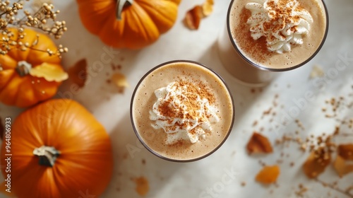 Top view of pumpkins and pumpkin coffee latte cup autumn fall composition background