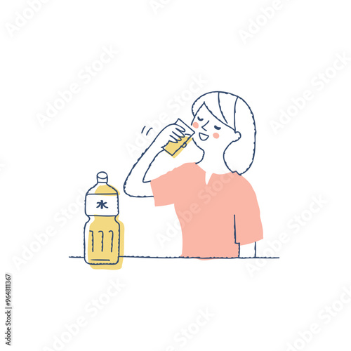 コップの水を飲んでいる女性