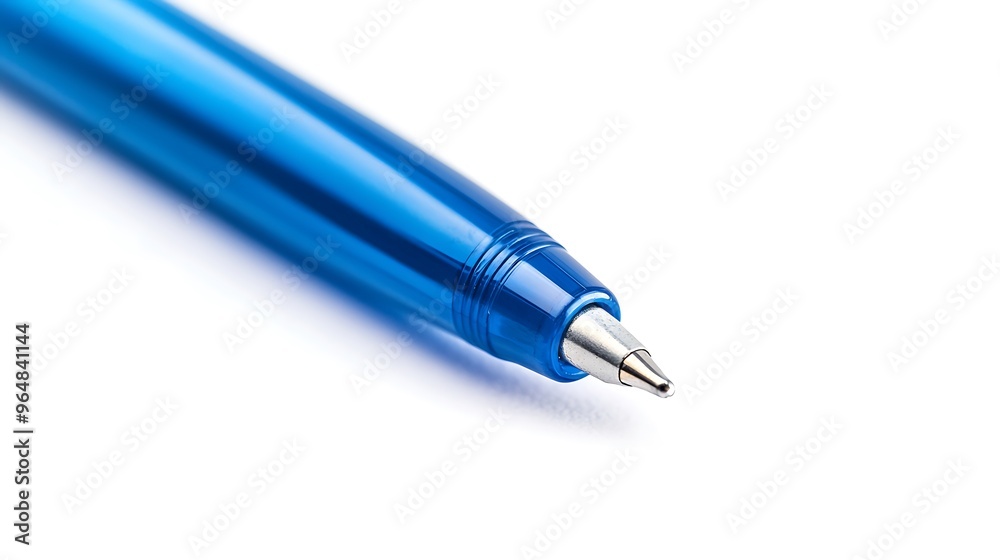 A macro shot of a blue ballpoint pen, captured in crisp detail on a white background. A macro shot of a blue ballpoint pen, captured in crisp detail on a white background.