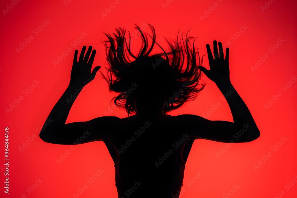 Silhouette of person in motion, vibrant red background, dynamic, energetic pose Silhouette of person in motion, vibrant red background, dynamic, energetic pose