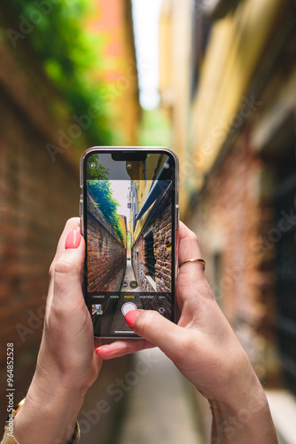 Taking picture of narrow street in Italy, venice