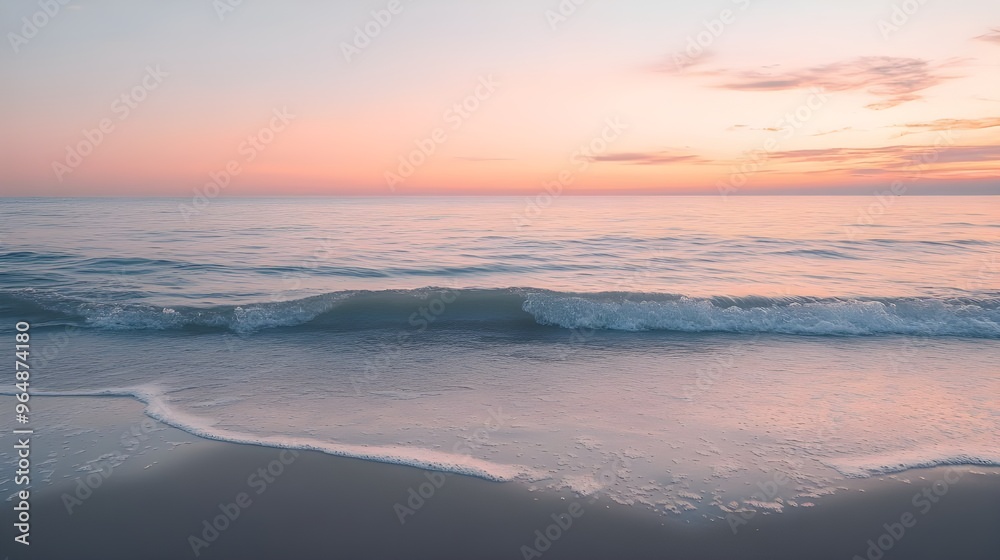 A tranquil stock photo of an empty beach with gentle waves lapping against the shore at sunset. A tranquil stock photo of an empty beach with gentle waves lapping against the shore at sunset.