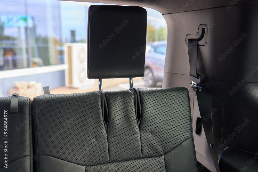 Fototapeta premium Car back seat with headrest and arm rest, a comfortable automotive fixture