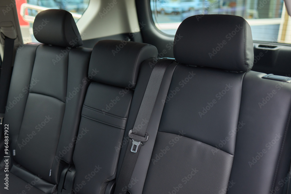 Car back seat with headrest and arm rest, a comfortable automotive fixture Car back seat with headrest and arm rest, a comfortable automotive fixture
