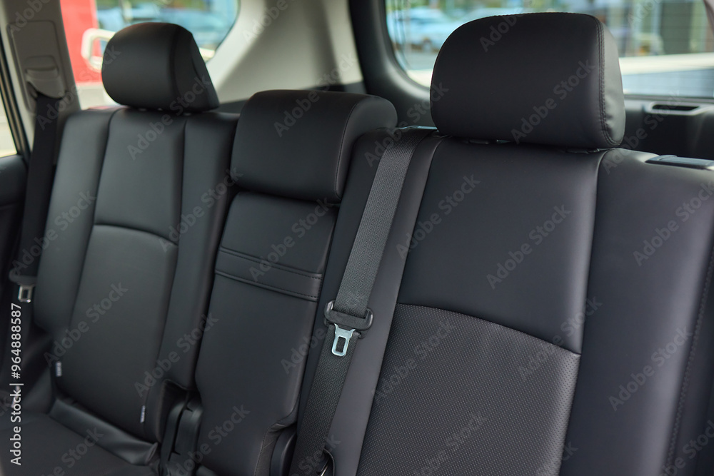 Car back seat with headrest and arm rest, a comfortable automotive fixture Car back seat with headrest and arm rest, a comfortable automotive fixture