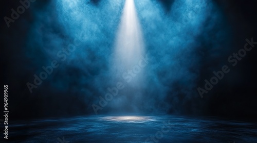 Deserted auditorium with a focused spotlight on stage wallpaper