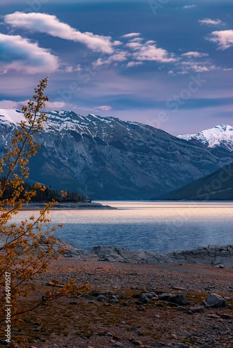 Morning Cloudy Sky Over Lake Minnewanka Mountains photo