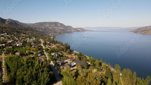 aerial video over Okanagan Lake from Peachland flying towards Kelowna, BC Canada travel and tourism photo