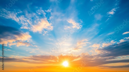 Sunny sunrise over horizon with vibrant clouds, peaceful morning concept