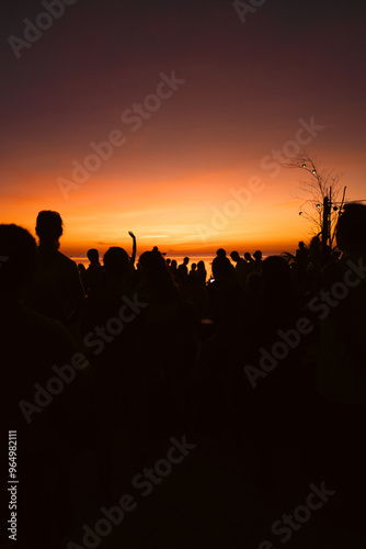 Canvas Print silhouette of a beach party