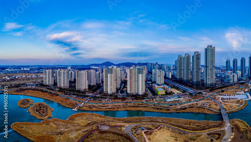 Seo-gu, Incheon, South Korea - January 3, 2021: Aerial and panoramic view of highrise apartments and Cheongna Lake Park at Cheongna International City photo