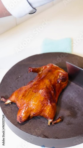chef chopping roast duck