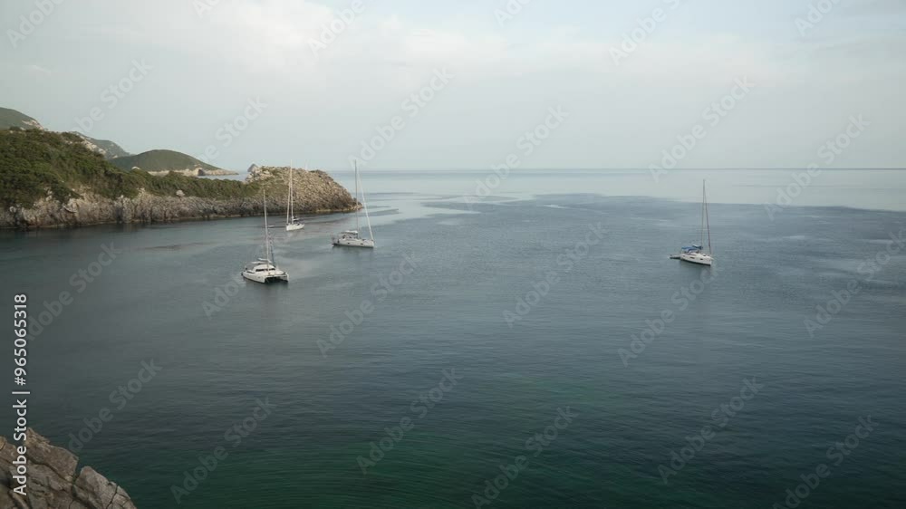 View of coastline and Ionian Sea near Palaiokastritsa at dusk, Palaiokastritsa, Corfu, Ionian Sea, Greek Islands, Greece, Europe View of coastline and Ionian Sea near Palaiokastritsa at dusk, Palaiokastritsa, Corfu, Ionian Sea, Greek Islands, Greece, Europe