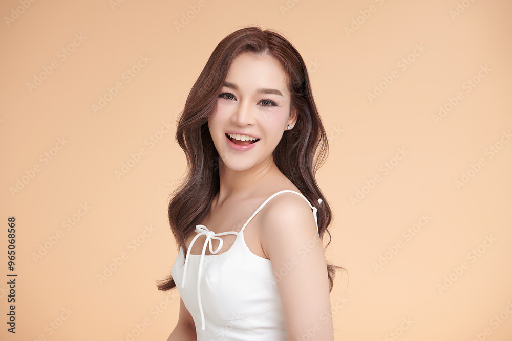 Obraz premium Beautiful young asian woman with clean fresh skin on beige background, Face care, Facial treatment, Cosmetology, beauty and spa, Asian women portrait.
