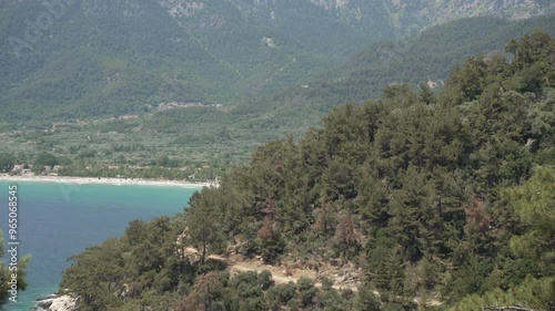 View of woodland and coastline near Chrysi Ammoudia, Chrysi Ammoudia, Thassos, Aegean Sea, Greek Islands, Greece, Europe photo