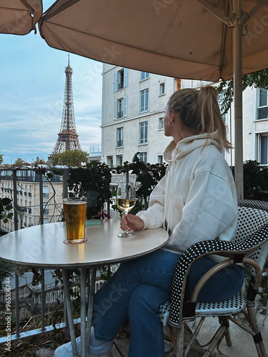 Photography person in cafe with Eiffel Tower view