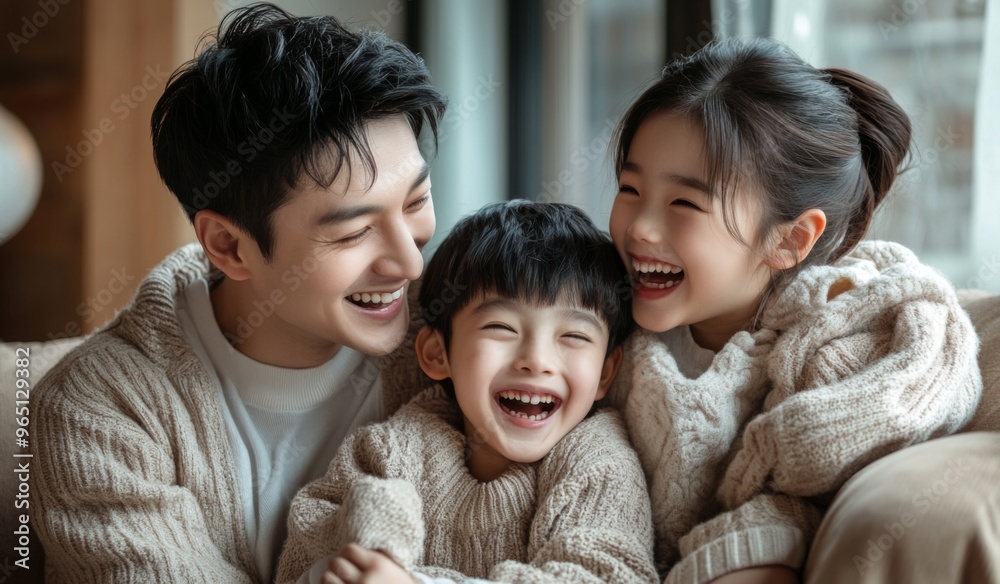 A happy Chinese family with two children sitting on the sofa at home, laughing and playing together in the living room. High-quality, realistic photograph. A happy Chinese family with two children sitting on the sofa at home, laughing and playing together in the living room. High-quality, realistic photograph.