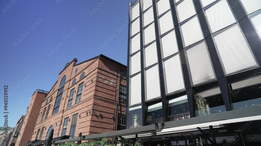 View of different styles of architecture on the waterfront on a sunny morning, Aker Brygge, Oslo, Norway, Scandinavia, Europe View of different styles of architecture on the waterfront on a sunny morning, Aker Brygge, Oslo, Norway, Scandinavia, Europe