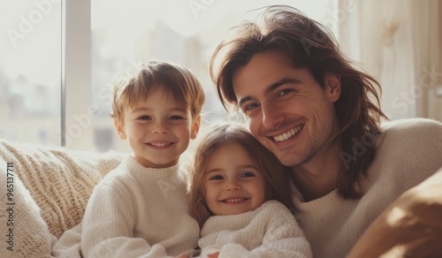 A happy family with two children sitting on the sofa at home, laughing and playing together in the living room. High-quality, realistic photograph. 