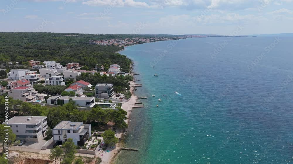 Aerial View of the Radmanand Petrcane Beach in Zadar, Dalmatia in Croatia. Summer Vacation Resort Famous Adriatic Beach on Petrcane Village Adriatic Sea 4K Video Aerial View of the Radmanand Petrcane Beach in Zadar, Dalmatia in Croatia. Summer Vacation Resort Famous Adriatic Beach on Petrcane Village Adriatic Sea 4K Video