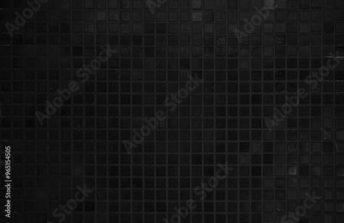 Dark black ceramic wall chequered and floor tiles mosaic background in room. Design pattern geometric with grid wallpaper texture decoration.