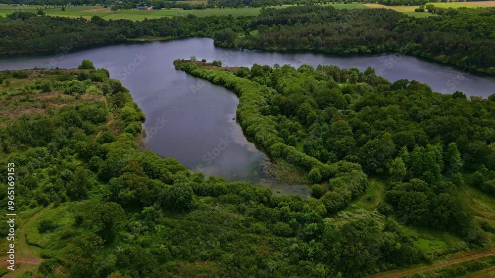 Roca lake and its natural environment, Saint-Thurial, France. Aerial drone view Roca lake and its natural environment, Saint-Thurial, France. Aerial drone view