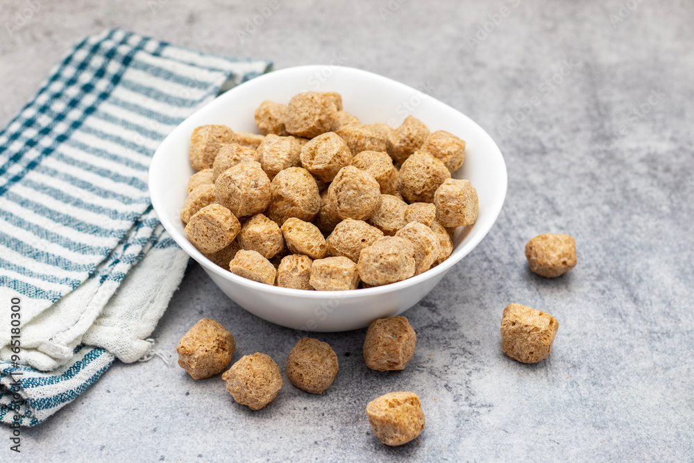 Raw soya chunks are dehydrated, protein-rich, plant-based meat substitutes made from defatted soy flour, commonly used in vegetarian dishes. Raw soya chunks are dehydrated, protein-rich, plant-based meat substitutes made from defatted soy flour, commonly used in vegetarian dishes.